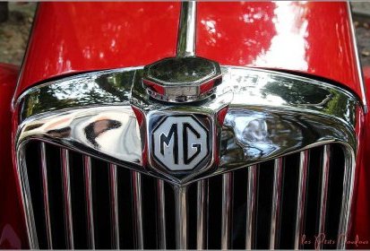 MG